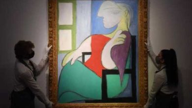 Pablo Picasso's -Woman sitting by a window