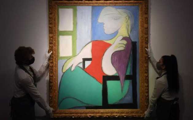 Pablo Picasso's -Woman sitting by a window