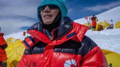 Zhang Hong-first-blind-chinese-mountaineer-climbs-mount-everest