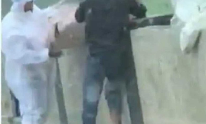 up-balrampur-two-men-caught-on-camera-throwing-covid-patients-body-into-river