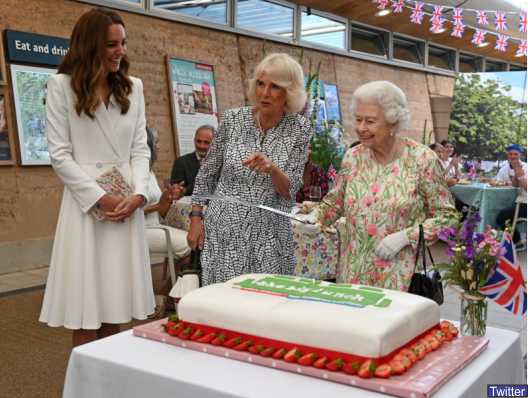 Britain's Queen Elizabeth insisted on cutting a cake