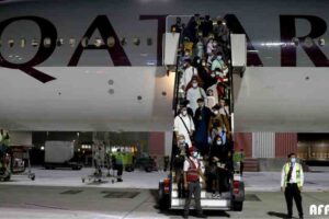 How did 200 Afghan children reach Qatar without a guardian?