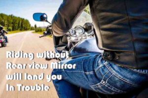 Riding without Rear view Mirror will land you In Trouble