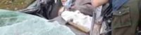Video of an elderly woman surviving in a car crushed by a Russian tank