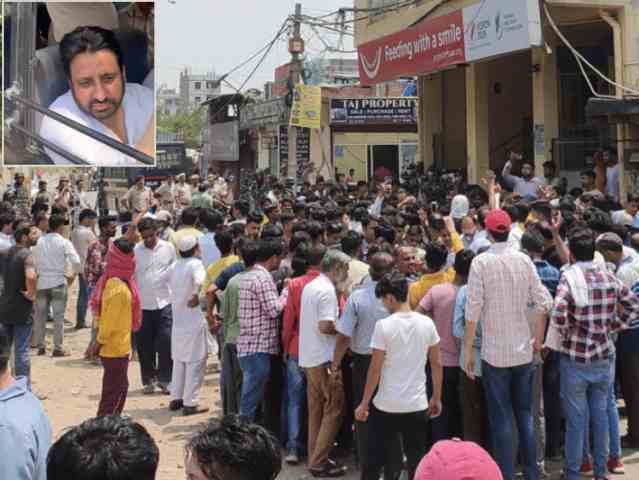 bulldozers in several areas of delhi aap mla in custody locals clash with police