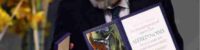 russian journalist dmitry muratov bids his nobel prize for ukrainian children