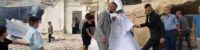 Wedding party on the rubble of a destroyed house, challenging the occupying enemy wedding party