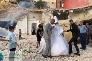 Wedding party on the rubble of a destroyed house, challenging the occupying enemy wedding party