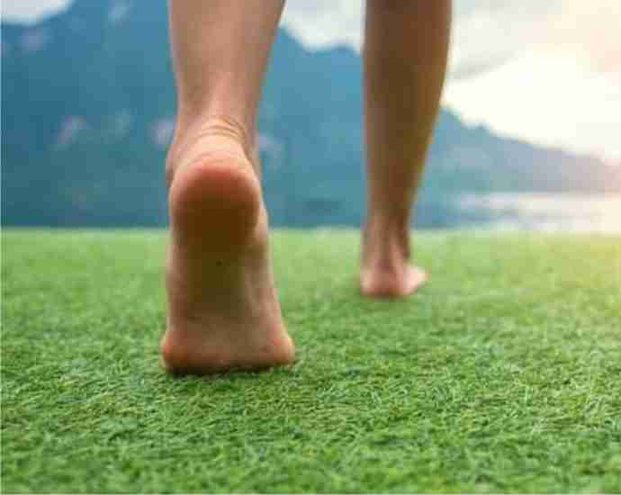 walking barefoot on grass