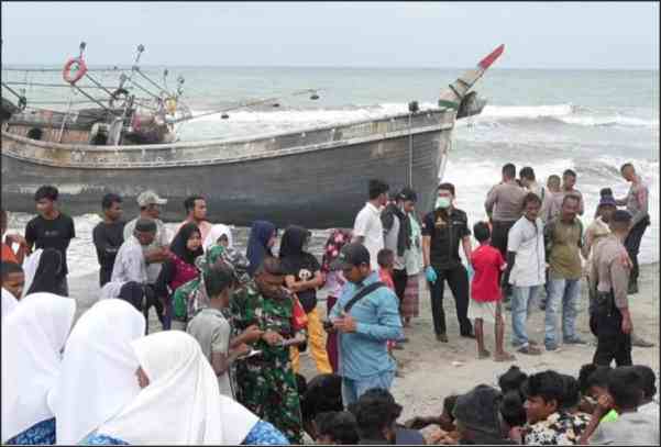 at least 69 rohingya refugees reach indonesia coast in wooden boat