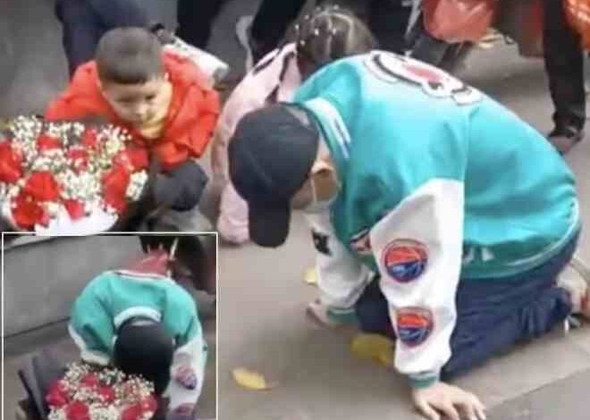 a man sat on his knees outside his ex girlfriend office in the rain for 21 hours begging her to marry him
