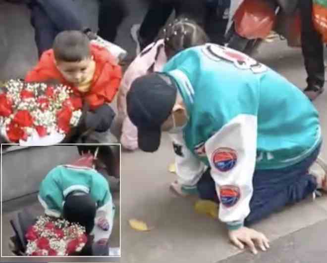 a man sat on his knees outside his ex girlfriend office in the rain for 21 hours begging her to marry him