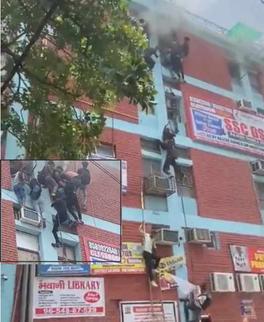 delhi fire in coaching center students saved by jumping from ropes