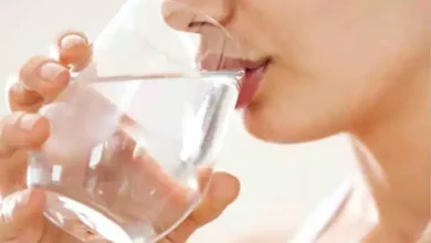 drinking water while standing