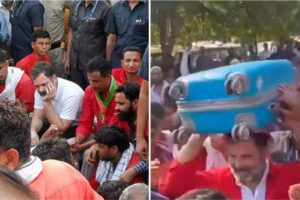 rahul gandhi arrived at the station wearing a coolie dress and carrying luggage