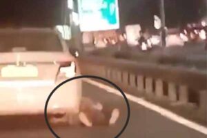 delhi after robbing a taxi the driver was dragged for 200 meters