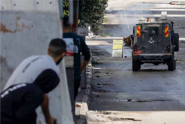 the israeli army raided refugee camps in the west bank dozens of palestinians were arrested