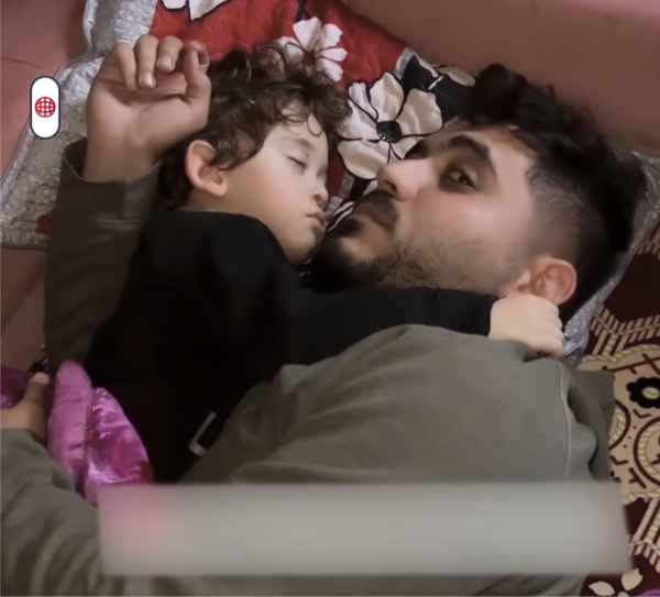 a palestinian father sleeping with his son close to his chest will die with