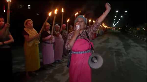 women held a torch rally in imphal the capital city against the ongoing violence in manipur