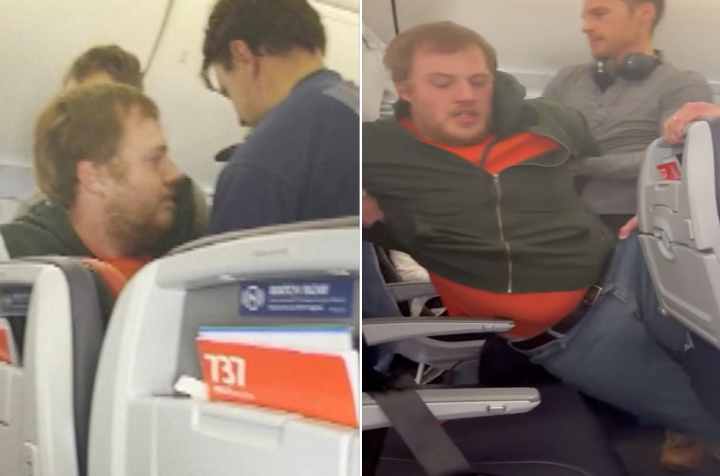 man tries to open plane emergency exit door on american airlines flight to chicago