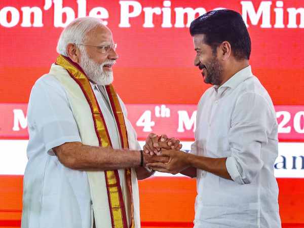 telangana cm revanth reddy pm modi adilabad