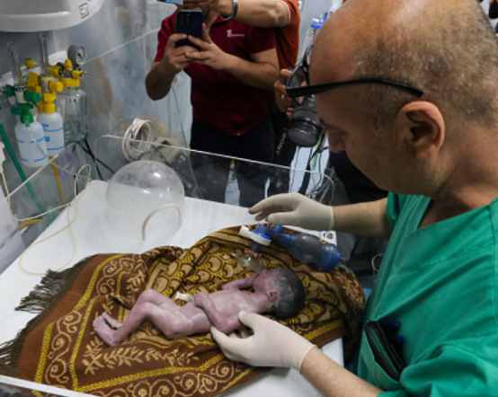 the baby girl in the womb of the woman who died in the israeli attack was saved
