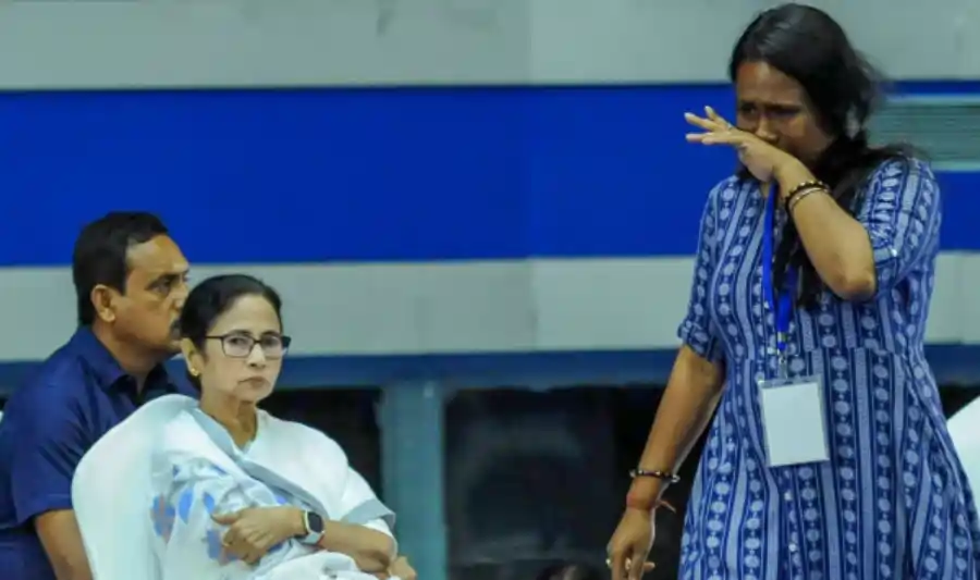 West Bengal CM Mamata Banerjee meeting with sacked teachers, expressing solidarity and promising to protect their jobs amidst Supreme Court verdict controversy.