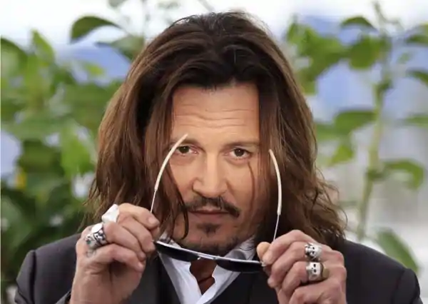 johnny depp 1 crore dollar per minute fee