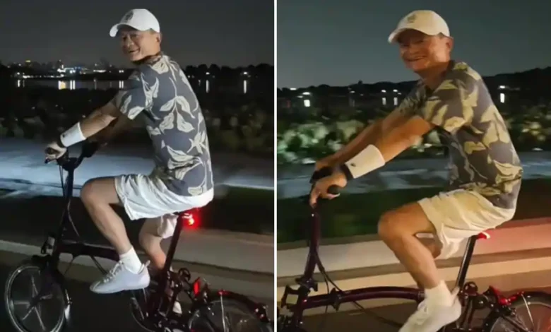 jack ma riding bicycle hangzhou